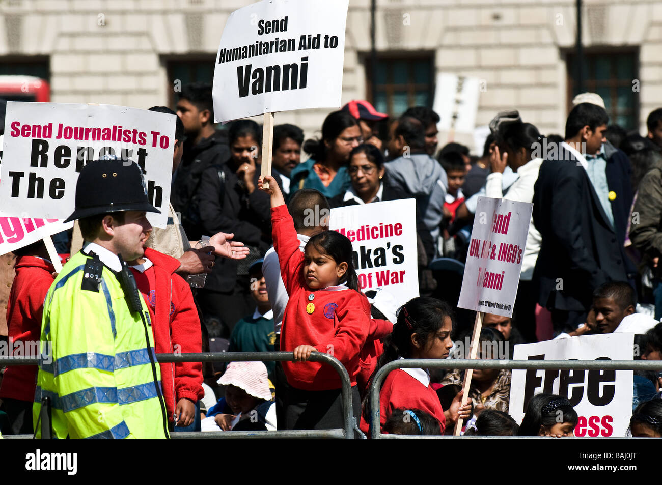 Children holding placards at the Tamil demonstration in London. Stock Photo
