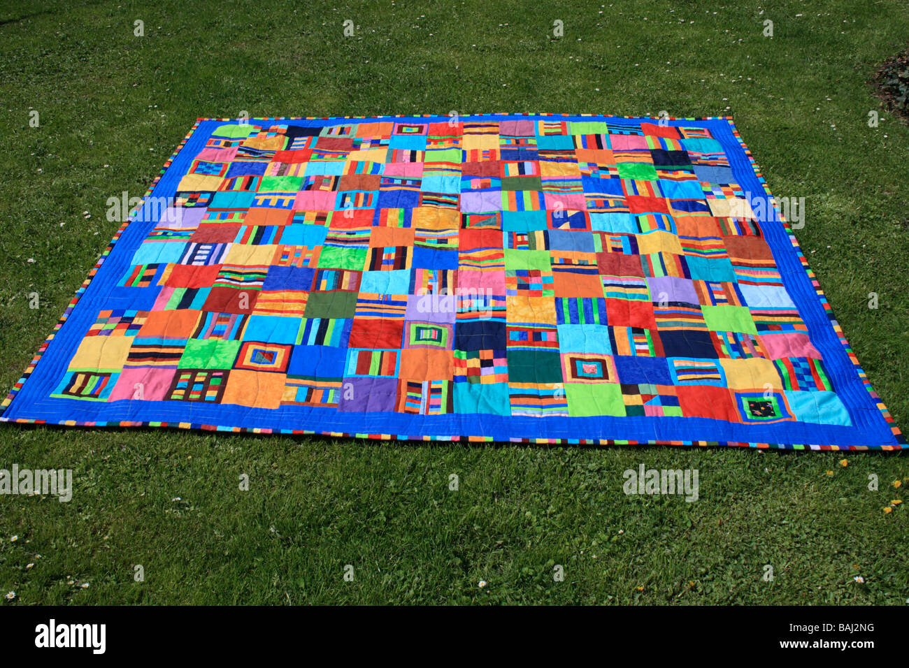 modern quilt on lawn. Photo by Willy Matheisl Stock Photo