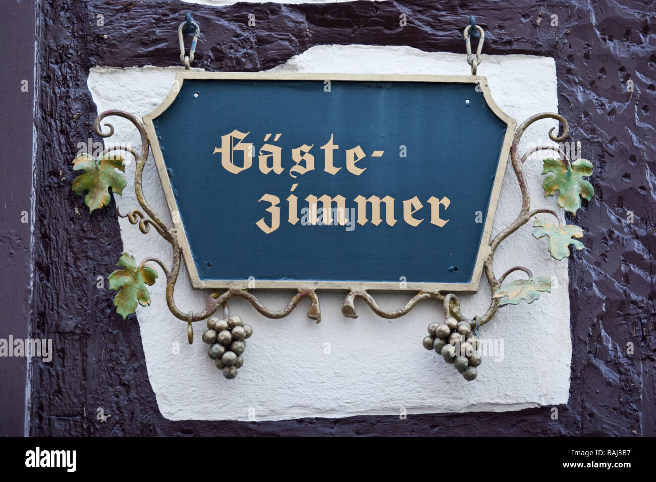 Wine production and shop sign in the old town of Bernkastel Kues the valley of Mosel river Rhineland Palatinate, Germany. Stock Photo