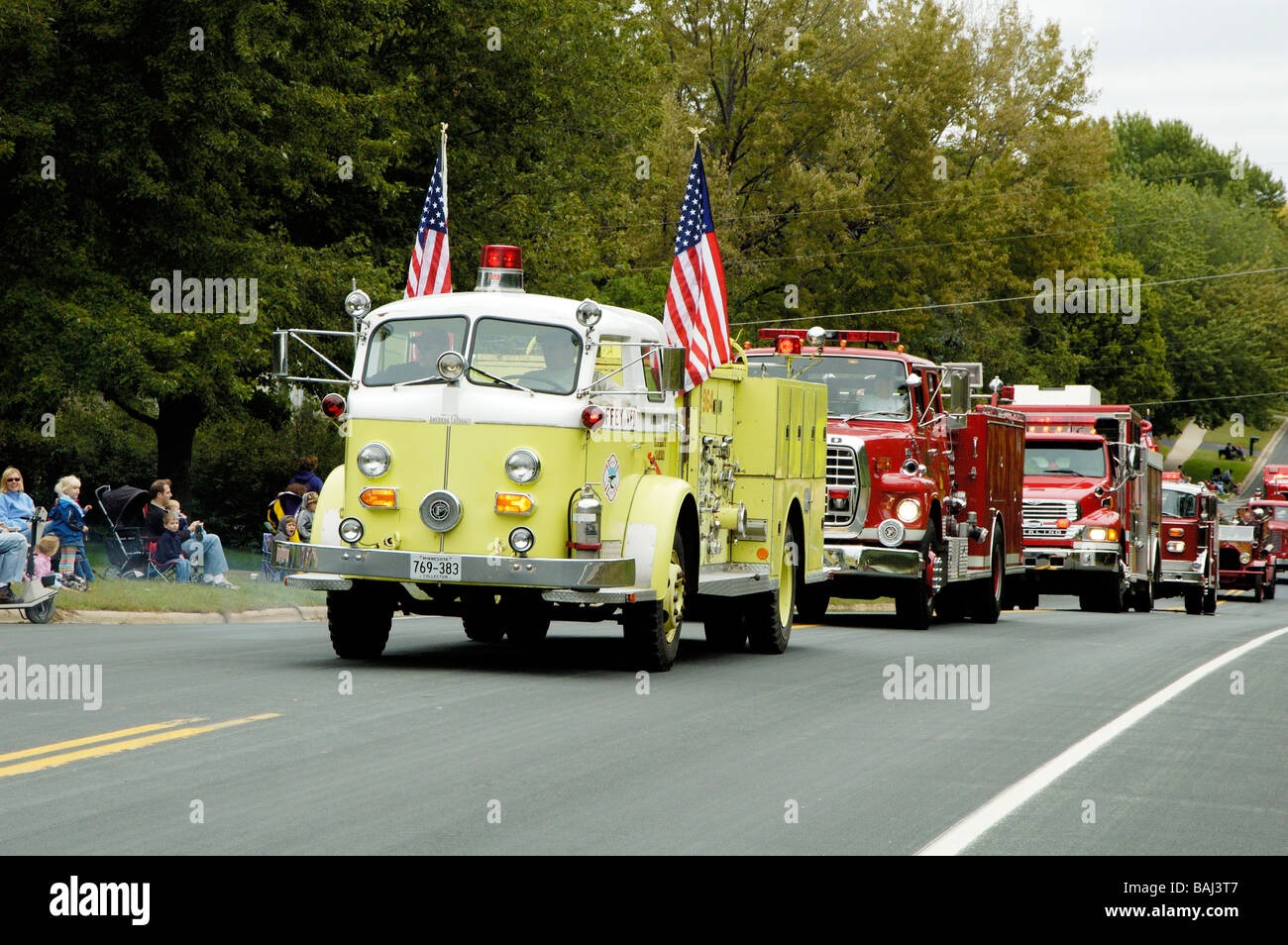 An antique fire department vehicle on display during a fire muster parade Stock Photo