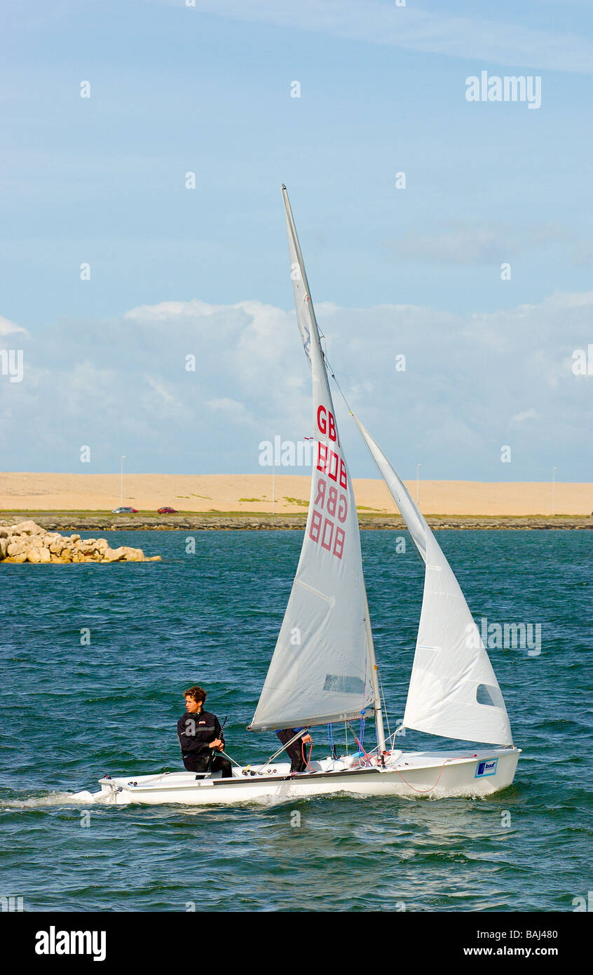 Sailing an International and Olympic 470 class sailing dinghy Weymouth