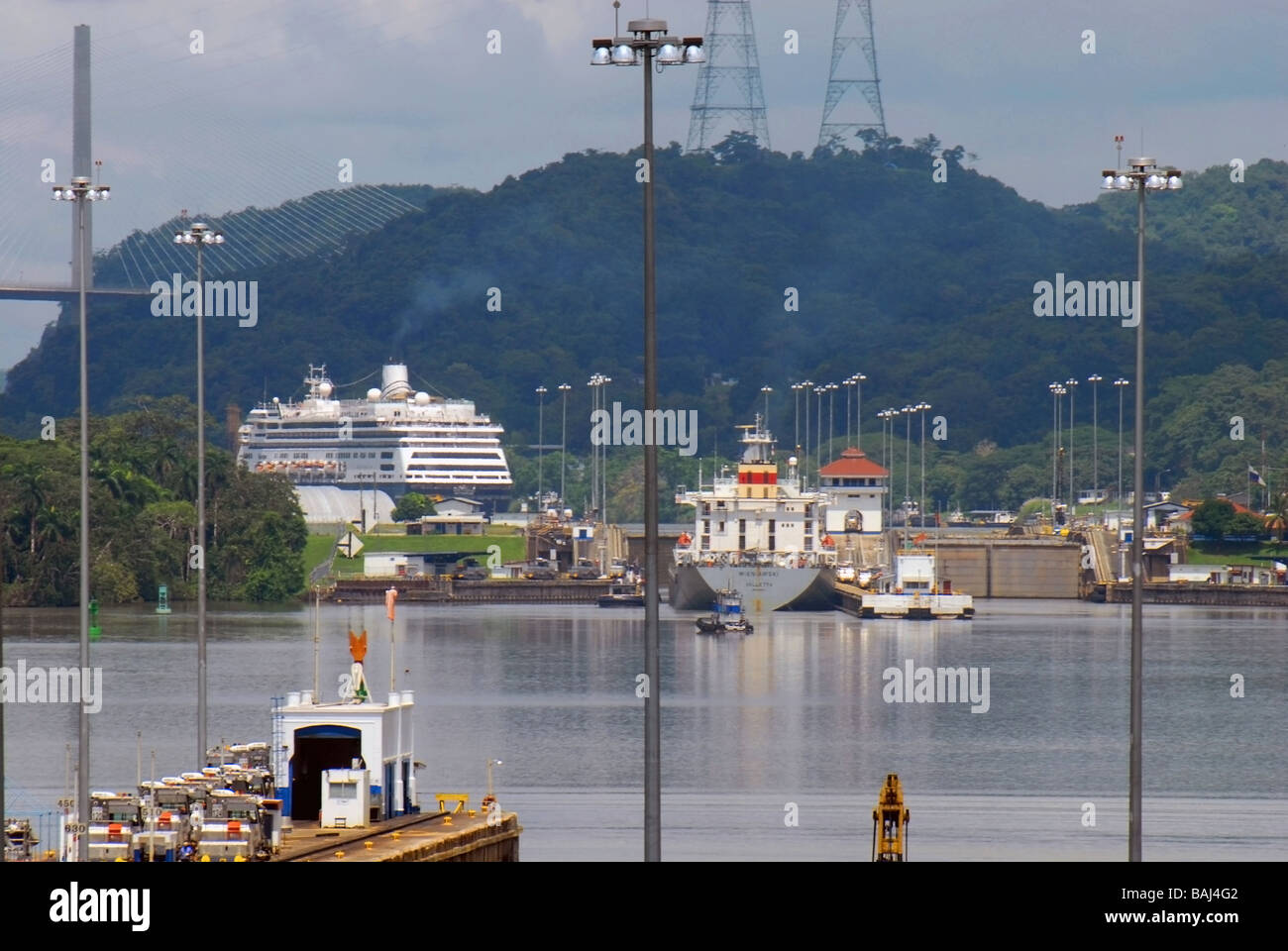 A cruiser ship passing through Panama Canal at midday Stock Photo