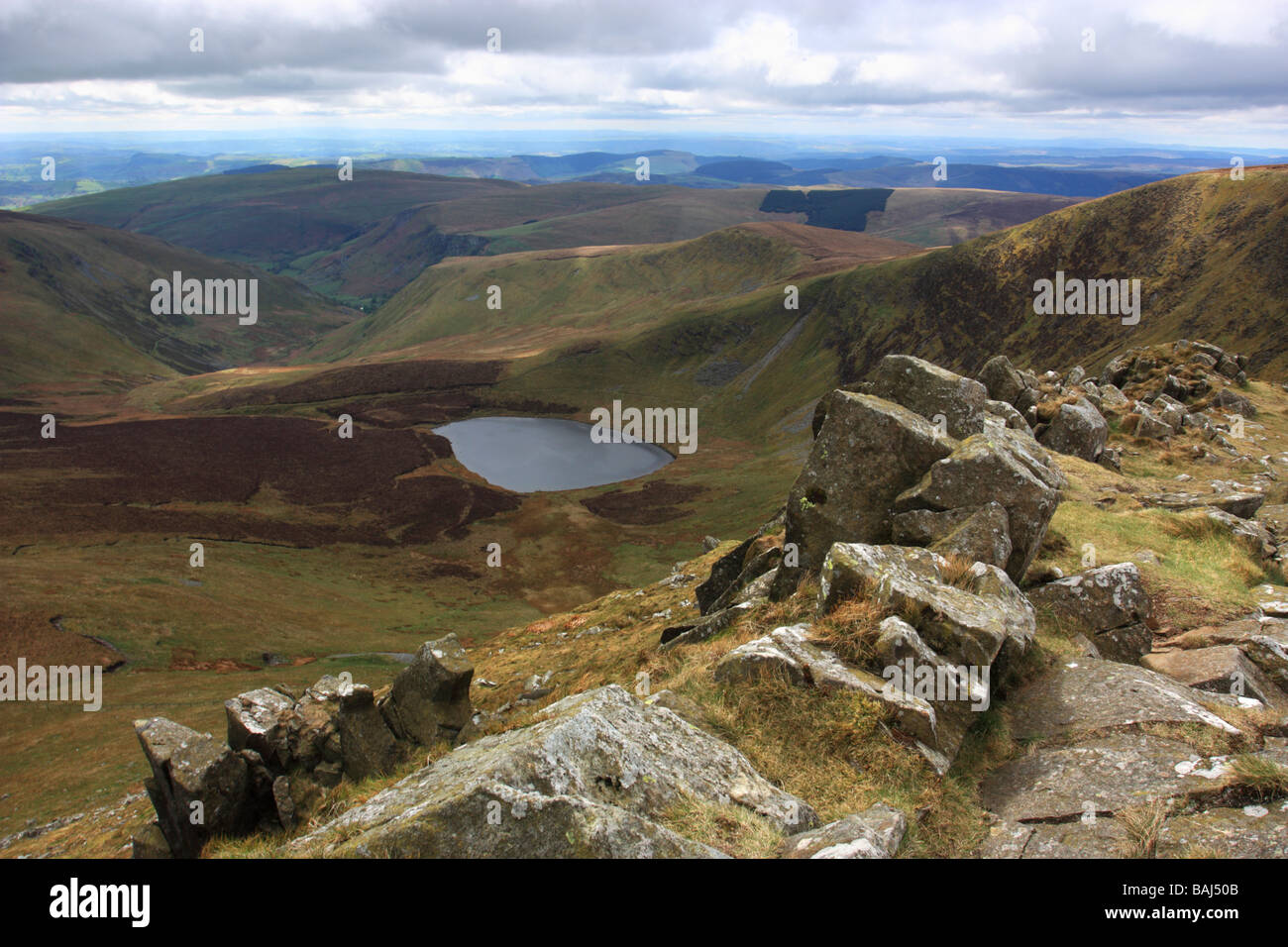 The view from the summit of Cadair Berwyn, down to Llyn Lluncaws Stock Photo