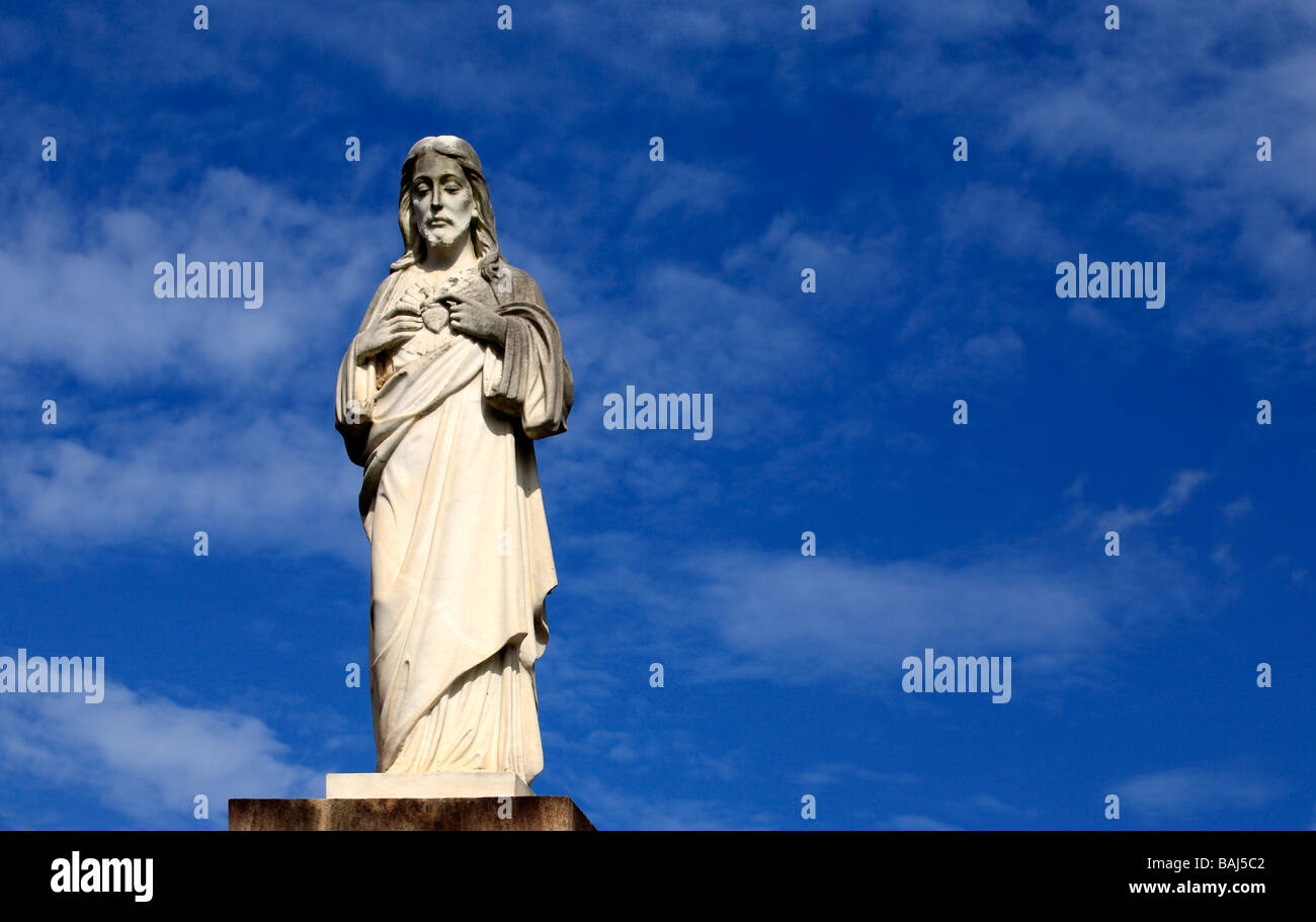 Statue of Jesus with a blue sky background Stock Photo - Alamy