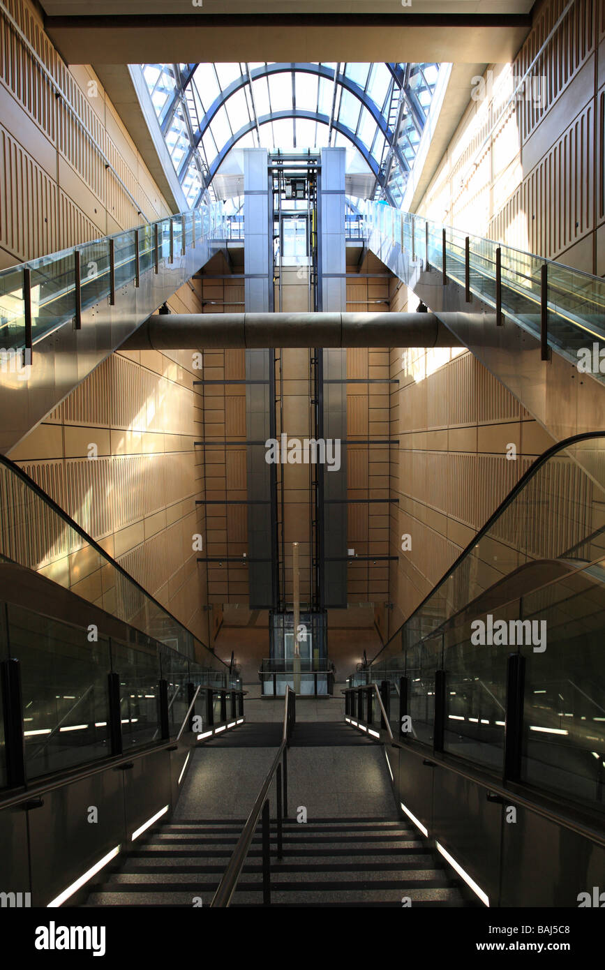 empty entrance to an underground station with stairs lift elevators and escalators Stock Photo