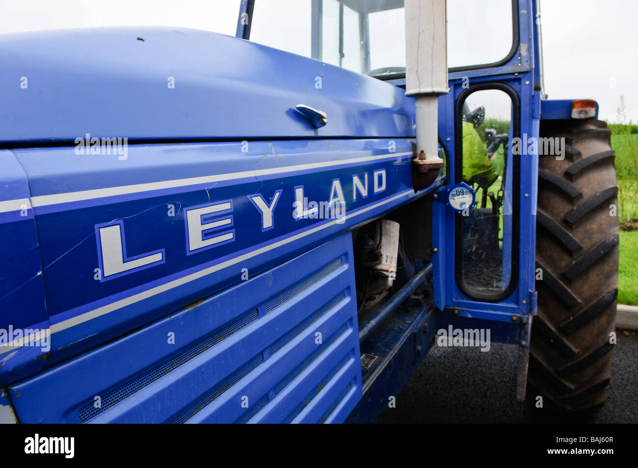 Side of a blue British Leyland vintage farm tractor Stock Photo