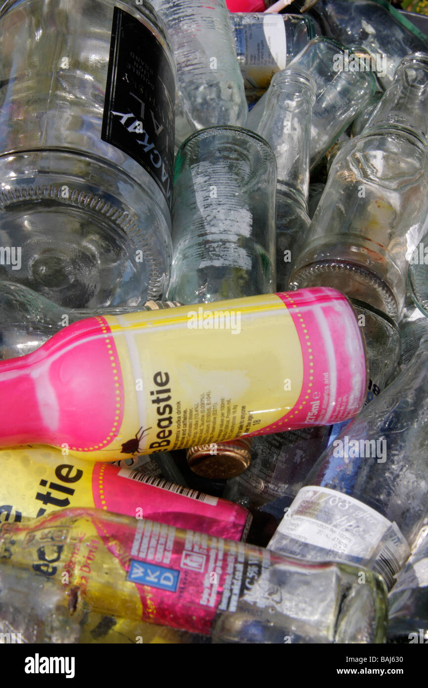 Glass bottles in bin for recycling Stock Photo Alamy