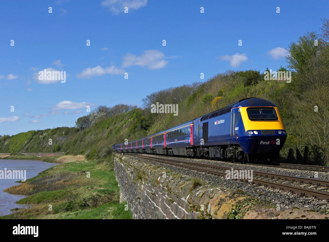 First Great Western HST lead by 43003 skirts the Severn Estuary with a diverted London Paddington Swansea service on 11 04 09 Stock Photo
