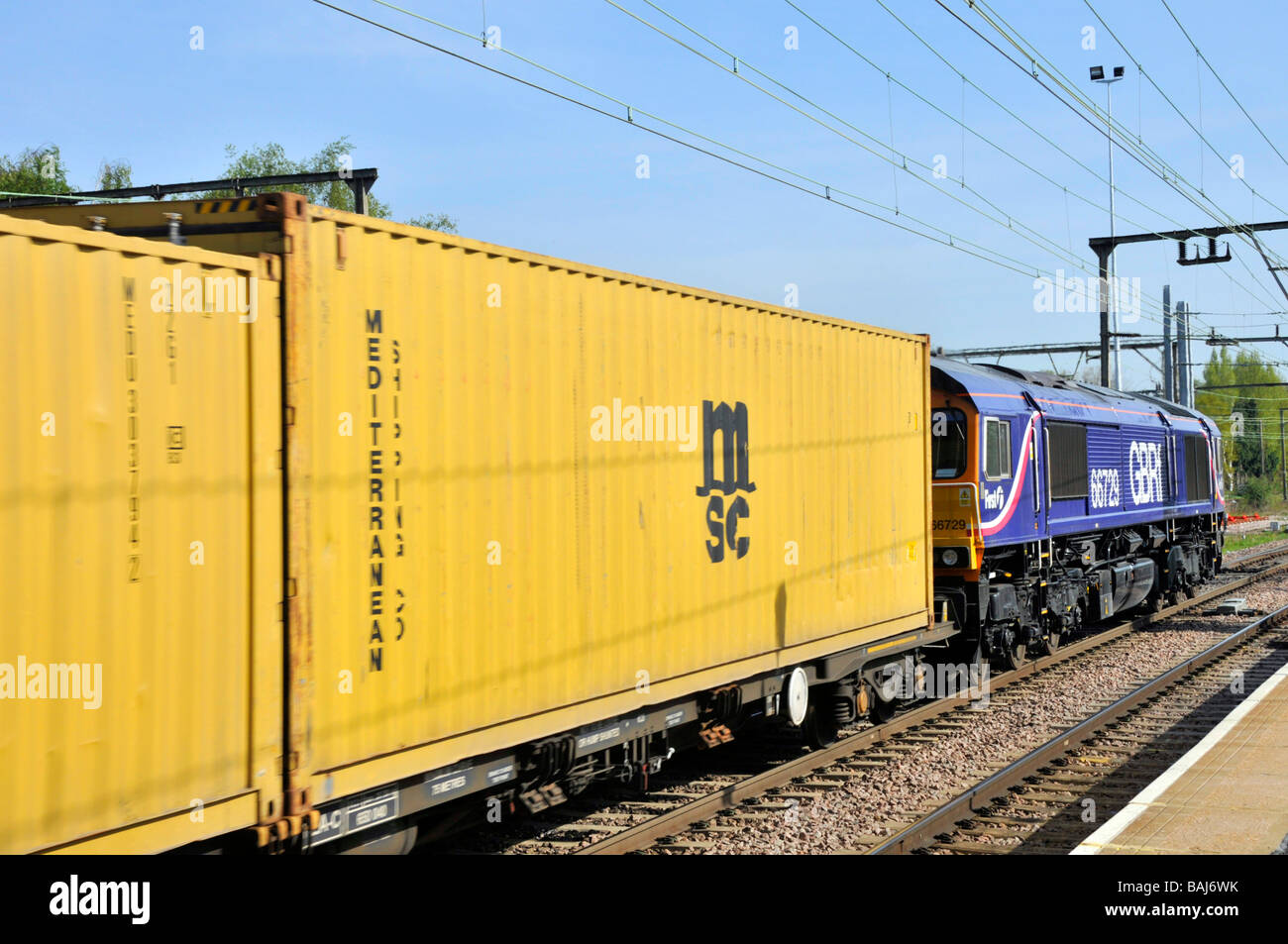 MSC containers express freight train passing through Shenfield station