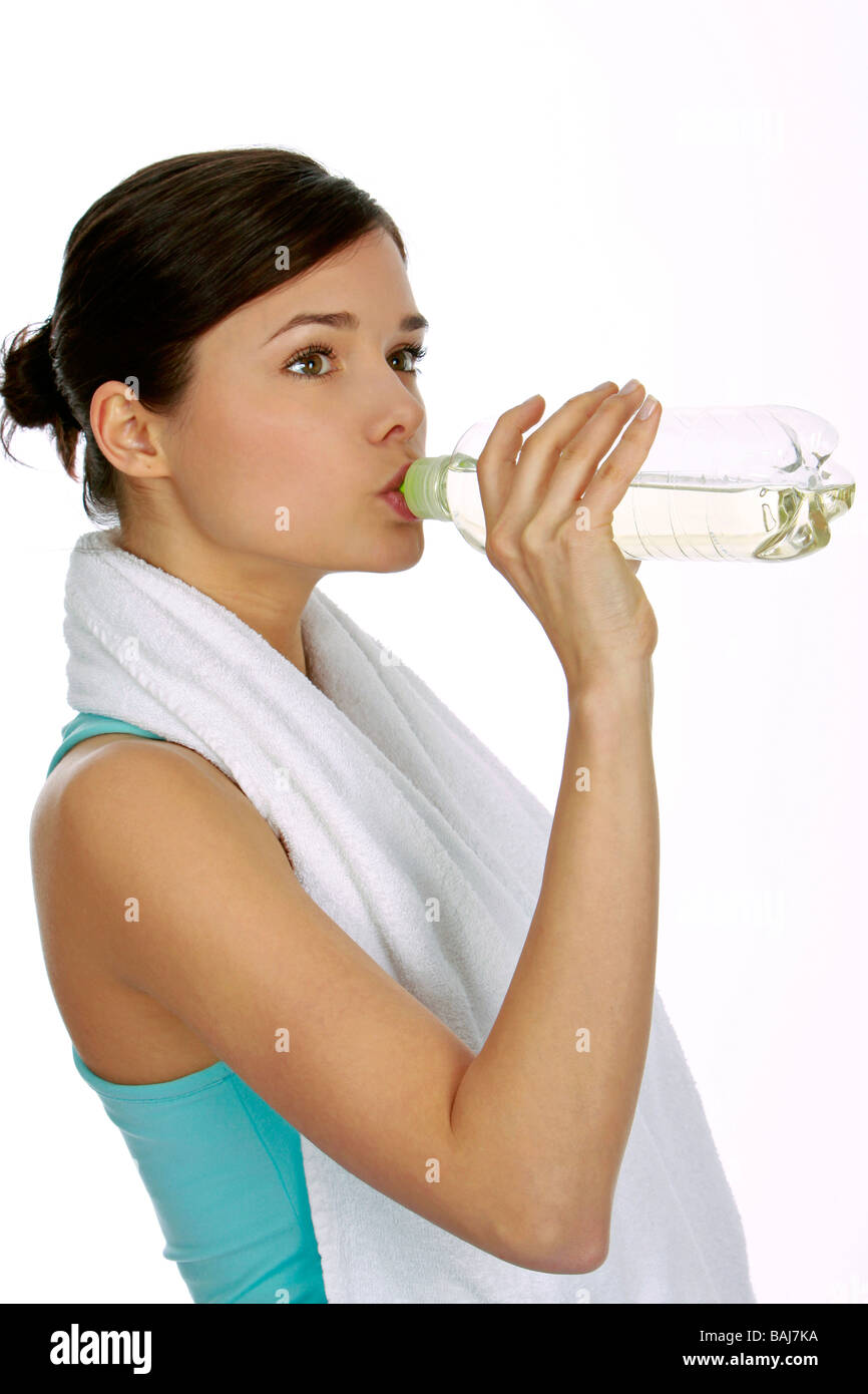 junge Frau in Sportdress mit Wasserflasche, woman drinking water Stock Photo