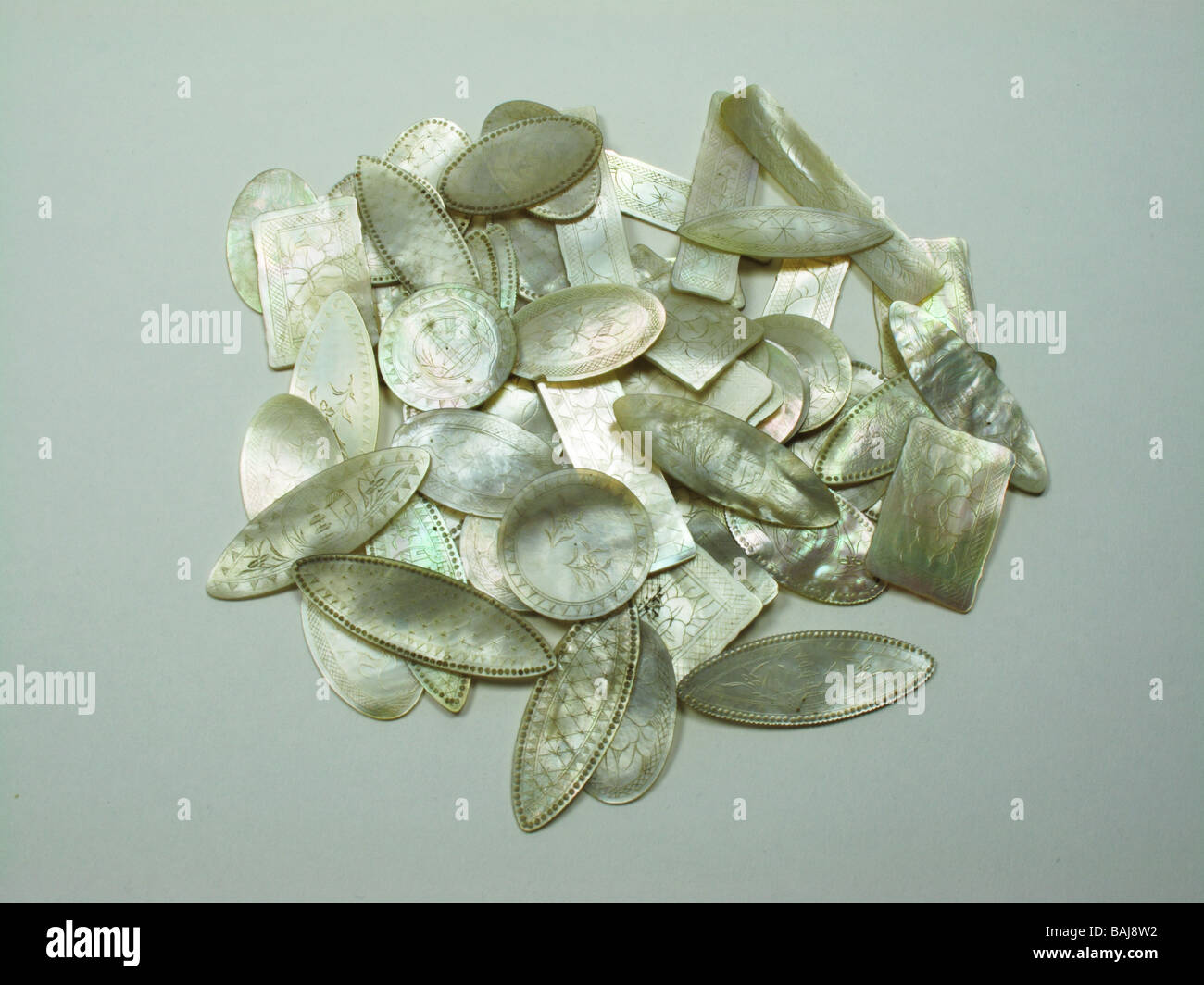 58 Antique Chinese mother of pearl gaming counters 18th century Stock Photo