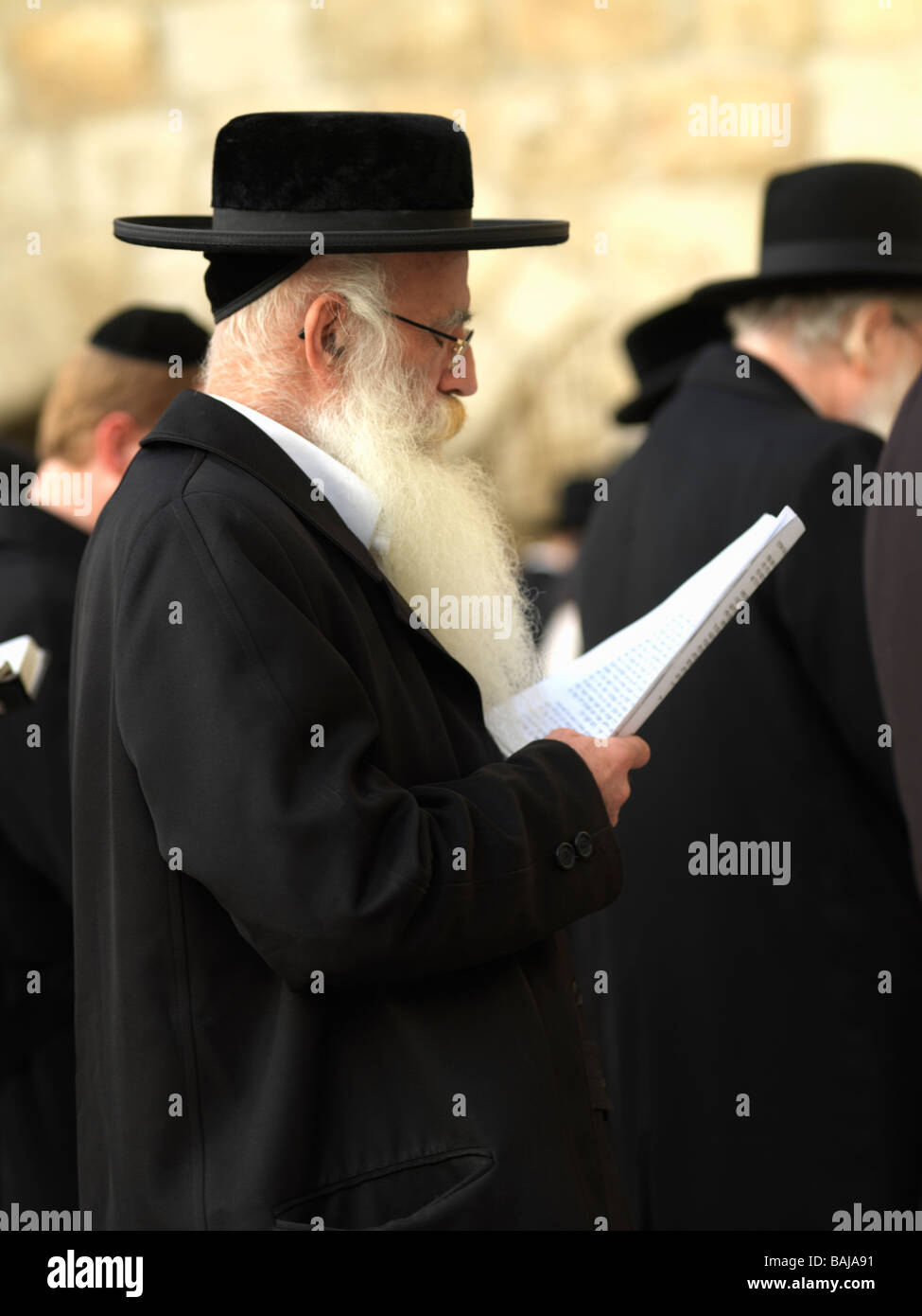 Israel Jerusalem Western Wall or Wailing Wall with worshipers Stock Photo