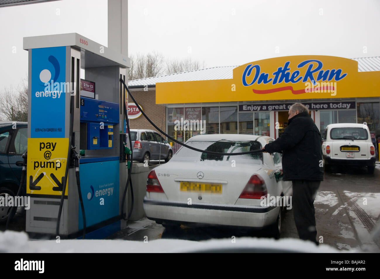 Petrol pump uk filling up hires stock photography and images Alamy