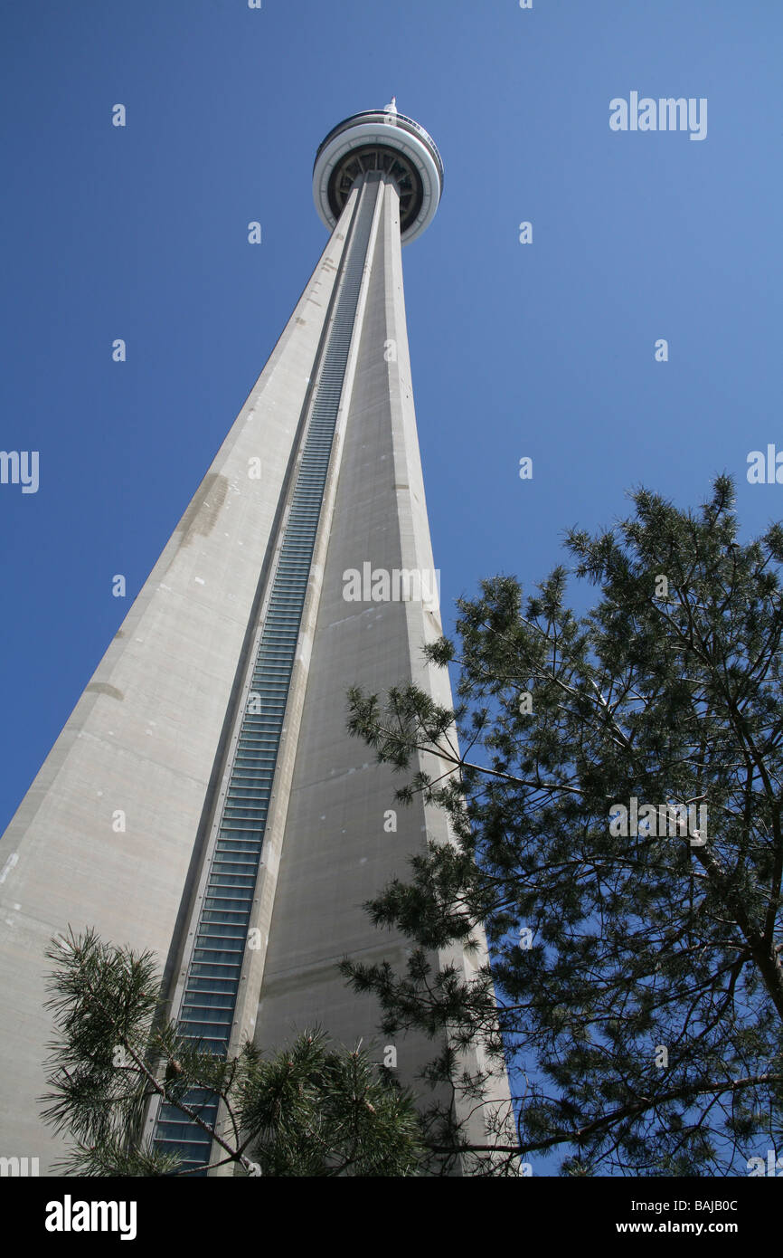 Sunny blue sky over Canadian National Tower, Toronto, Canada, low angle ...