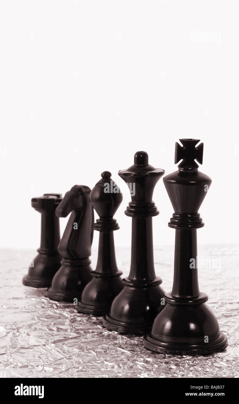 Row of black chess pieces with copy space Stock Photo