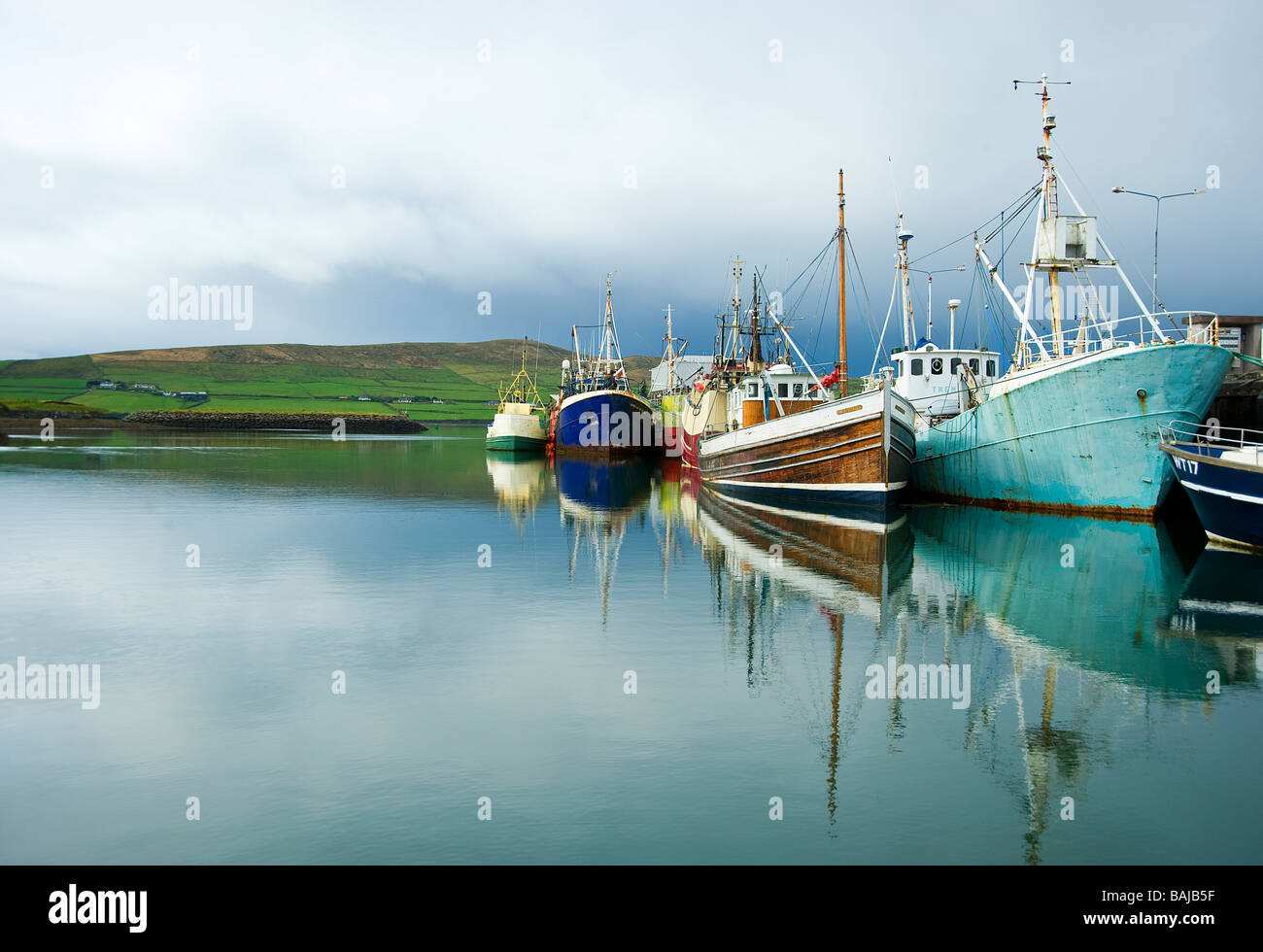 Reflections of ships in the small town of Dingle Bay, Dingle Bay Peninsula, County Kerry, Ireland Stock Photo
