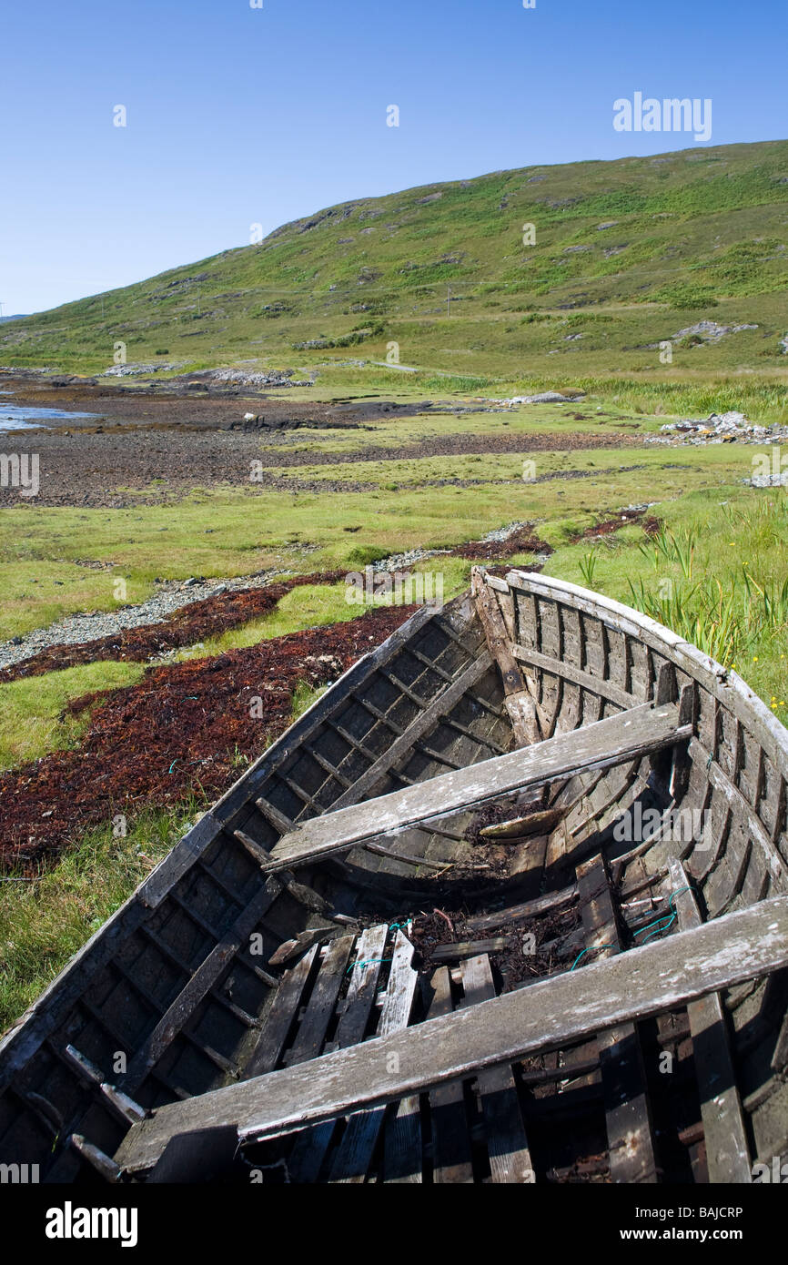 Old rowboat in a field Stock Photo - Alamy