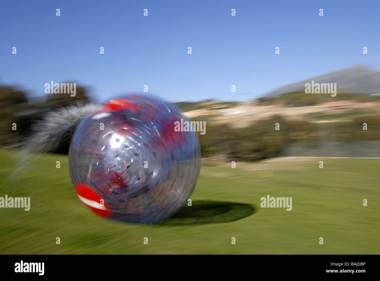 Ball rolling down hill hi-res stock photography and images - Alamy
