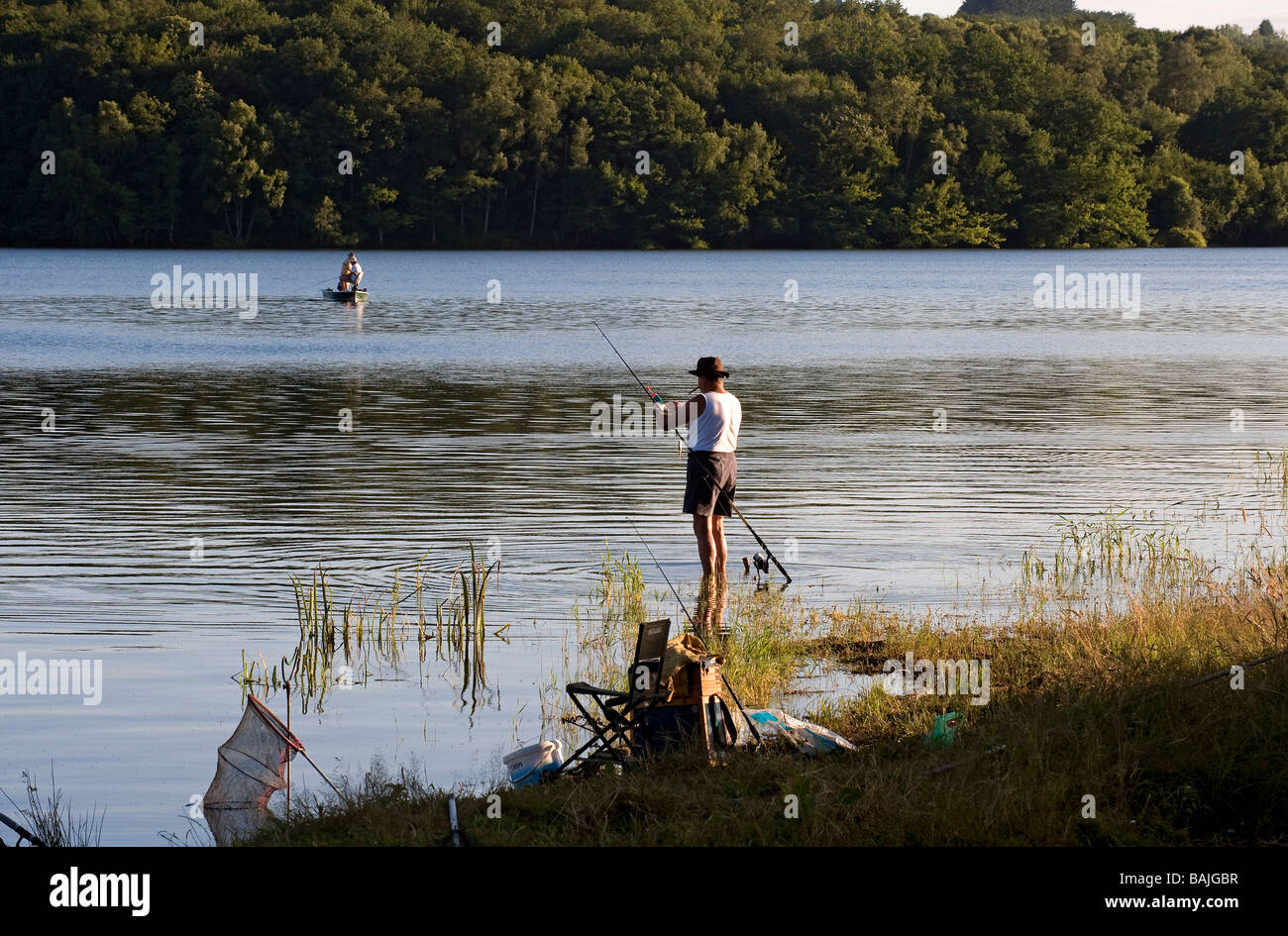 France, Nievre,  Lake Pannecière, angling in the evening Stock Photo