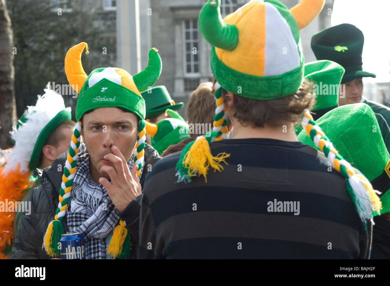 Men wearing viking hats in crowd at St Parick's Day parade, Dublin