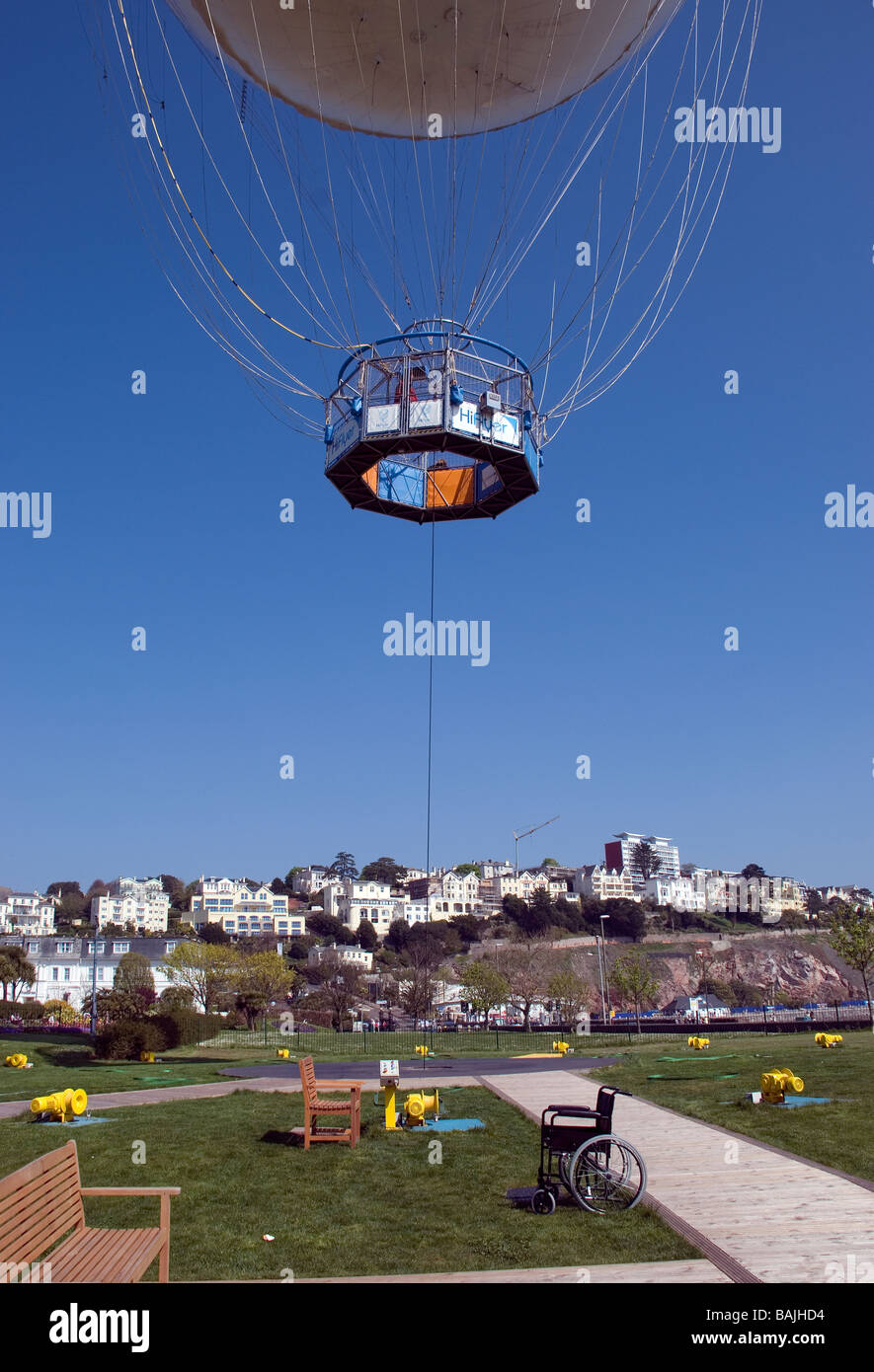 Wheelchair and balloon in torquay devon hires stock photography and