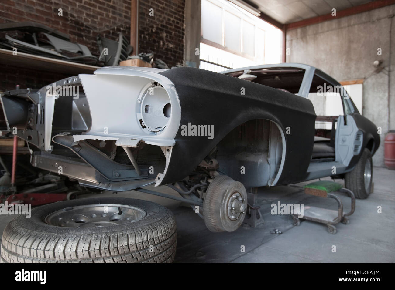 Car parts in garage Stock Photo - Alamy