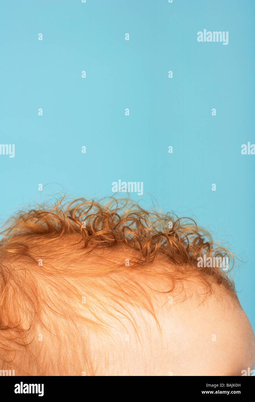 Redheaded baby, top of head Stock Photo Alamy