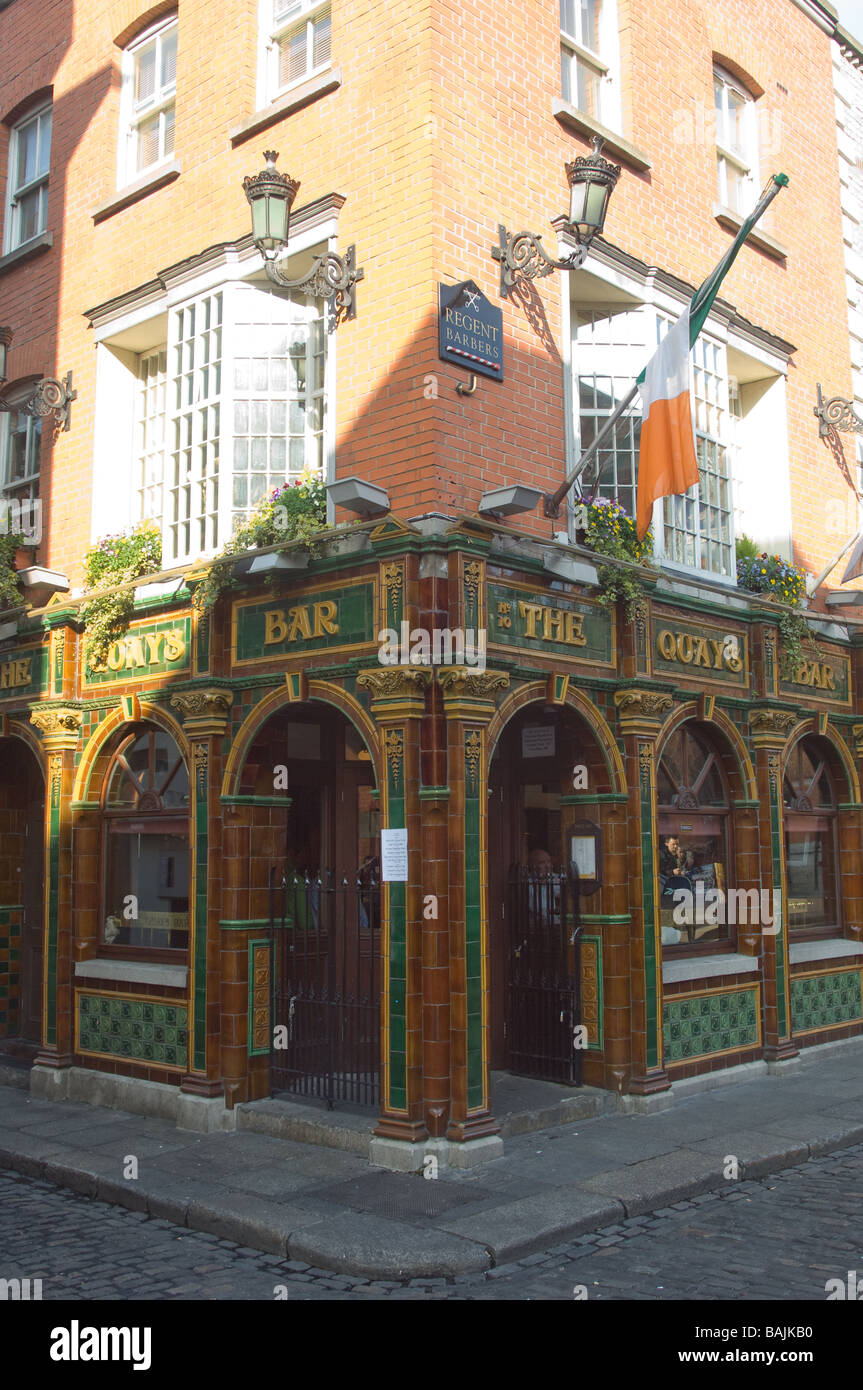 Traditional wall tiled corner bar on cobbled street inTemple bar, Dublin, Ireland Stock Photo