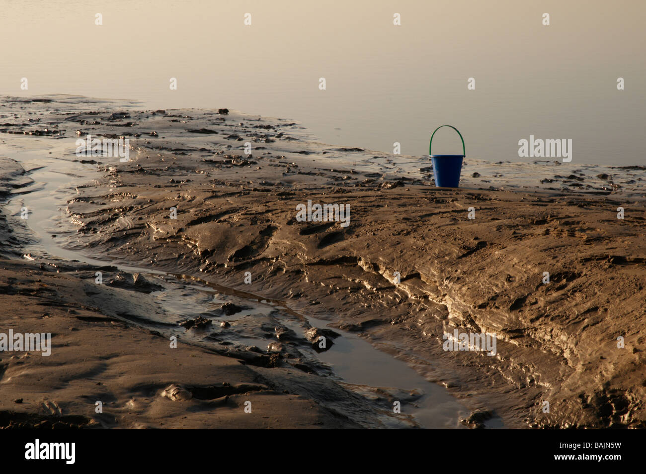 Bucket Left Forgotten Bucket A bucket left on the beach Stock Photo - Alamy