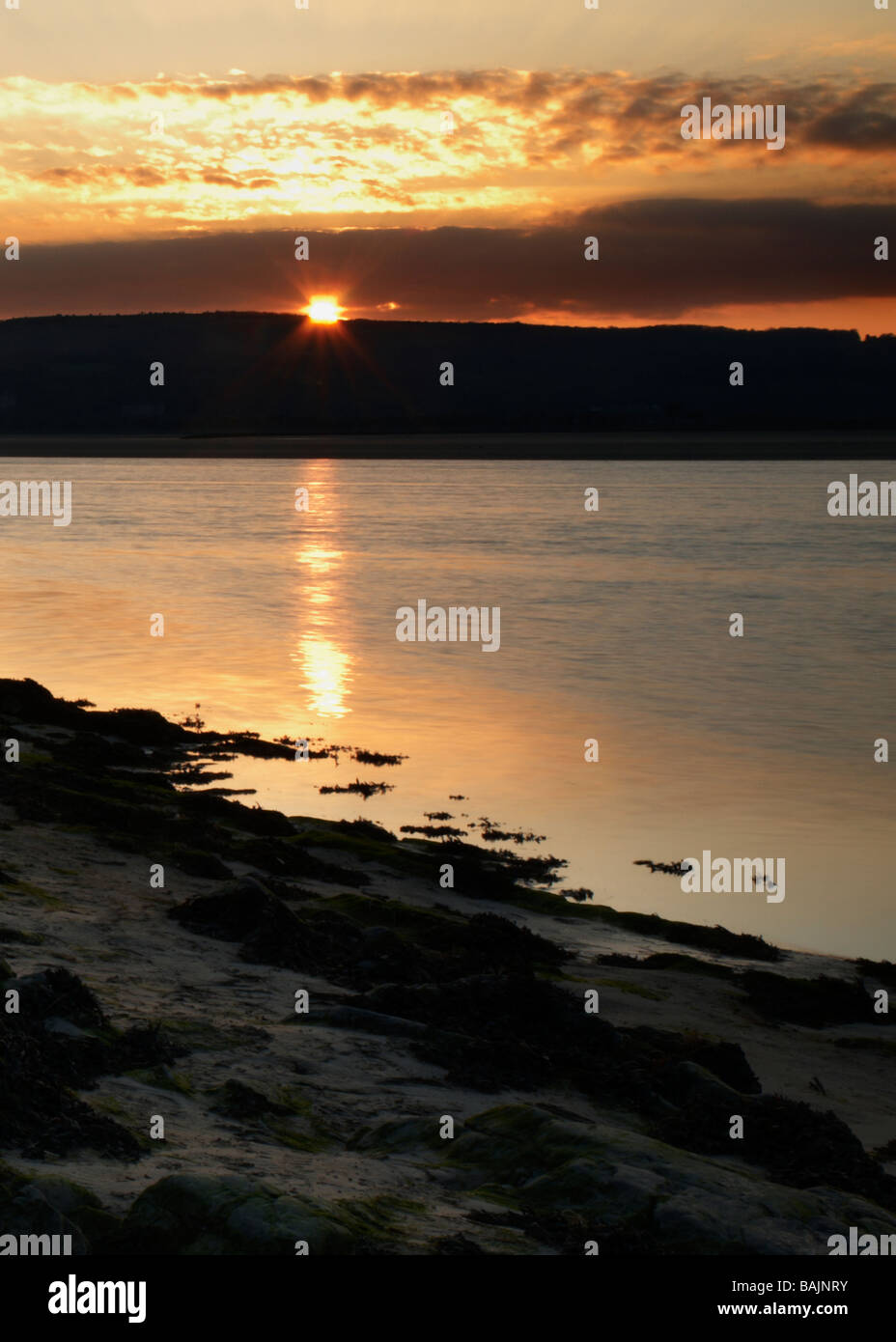 Morecambe Bay Sunset across the Kent Estuary at Arnside in Cumbria Stock Photo