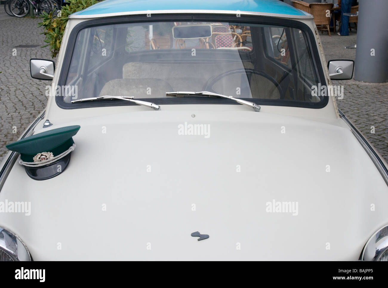 military hat on Trabant Car Checkpoint Charlie Berlin Stock Photo