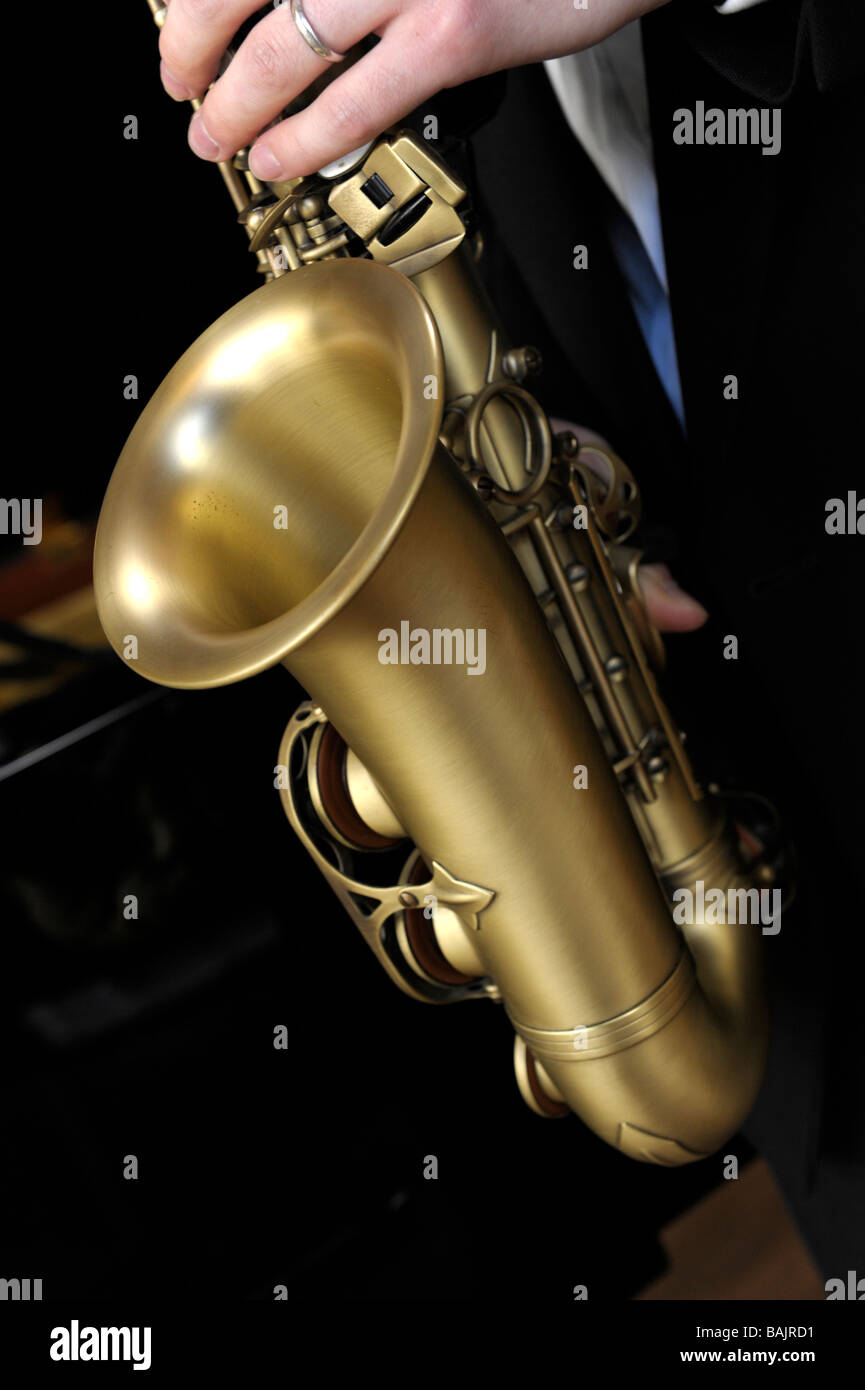 Close-up of alto saxophone being played Stock Photo