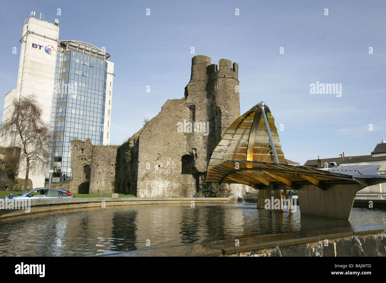 City of Swansea, South Wales. Castle Square water feature containing the Amber Hiscott glass leaf sculpture. Stock Photo