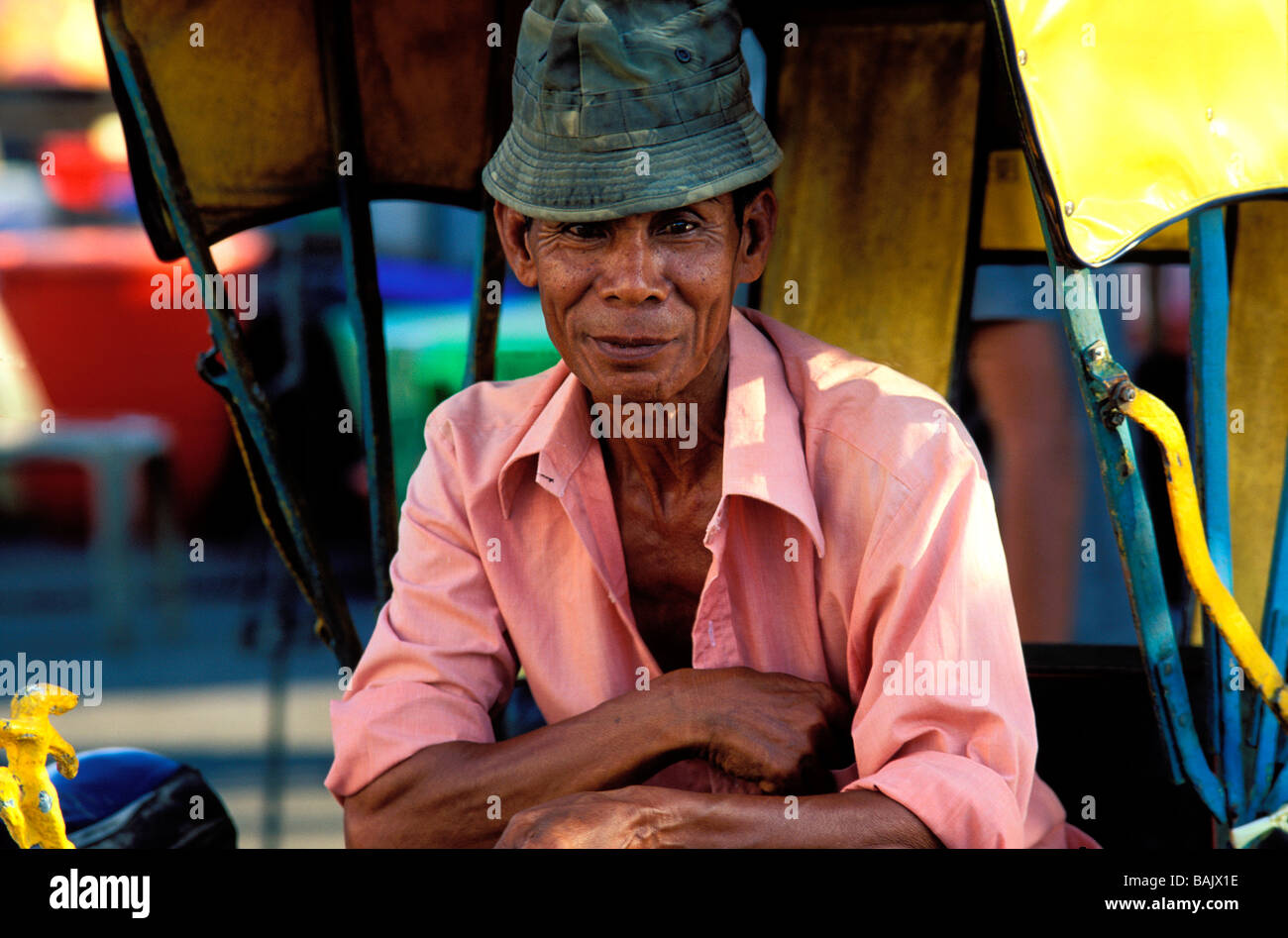 Malaysia, Kelantan State, Kota Bharu, driver of trishaw (taxi bike) Stock Photo