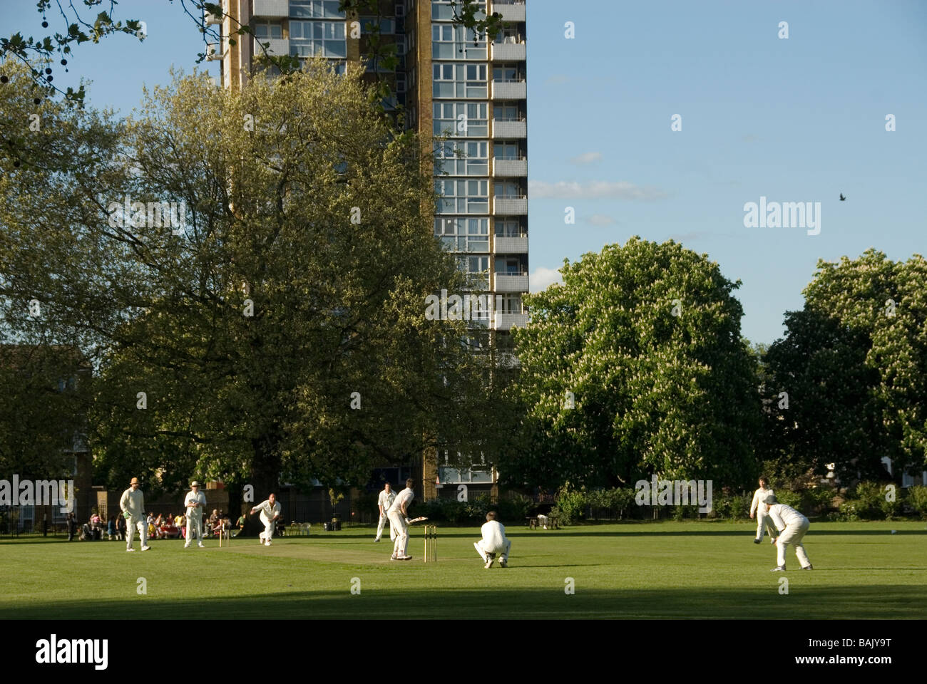London Fields April 26th Sunday in the park Playing cricket Stock Photo