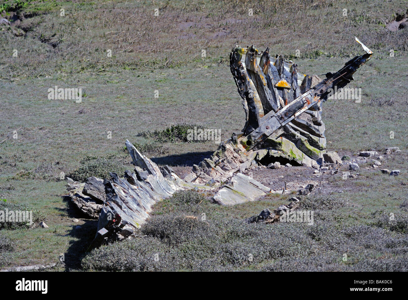 Remains of wooden boat on beach. Walney Channel, Walney Island, Cumbria, England, United Kingdom, Europe. Stock Photo