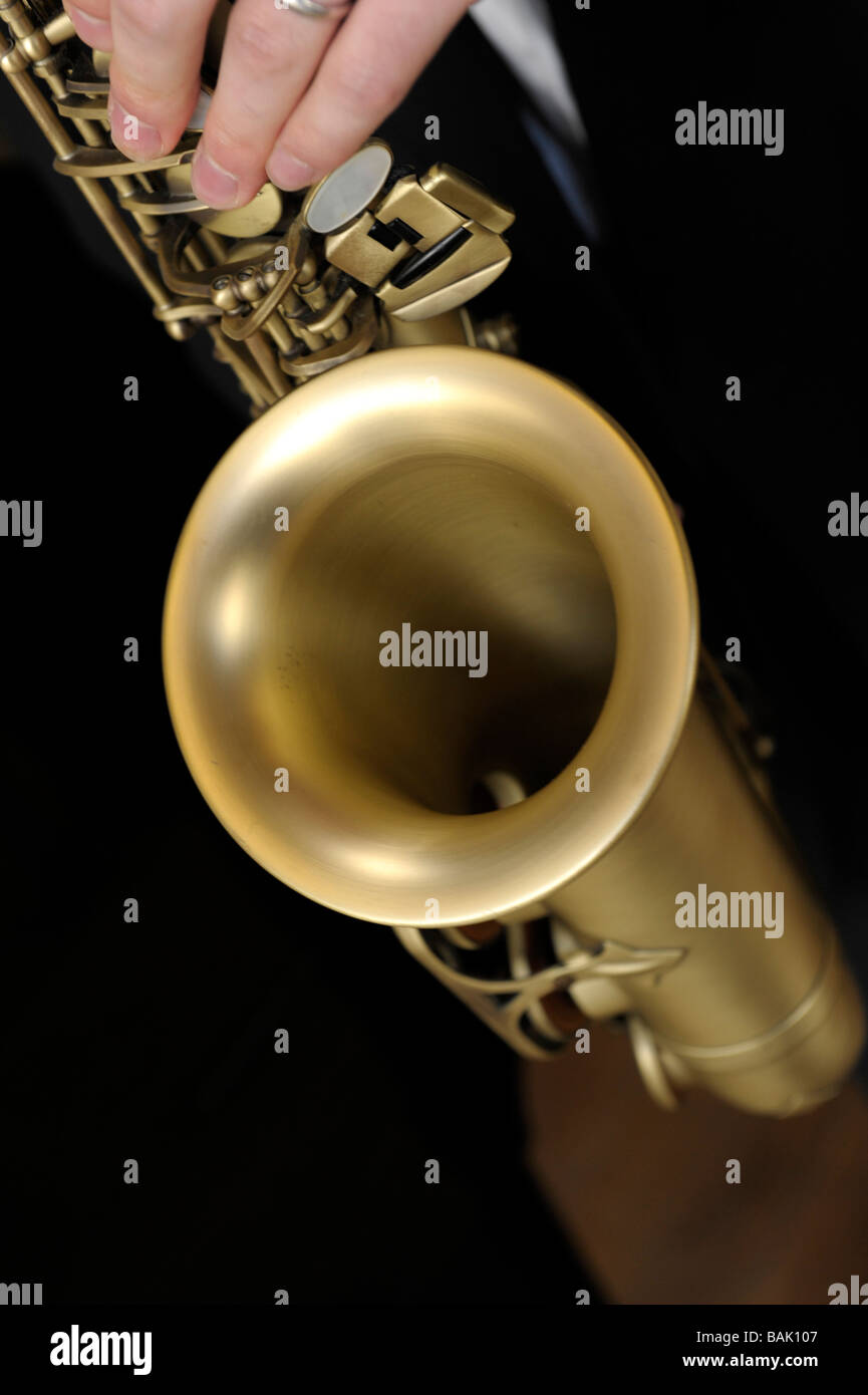 Closeup of alto saxophone being played Stock Photo Alamy