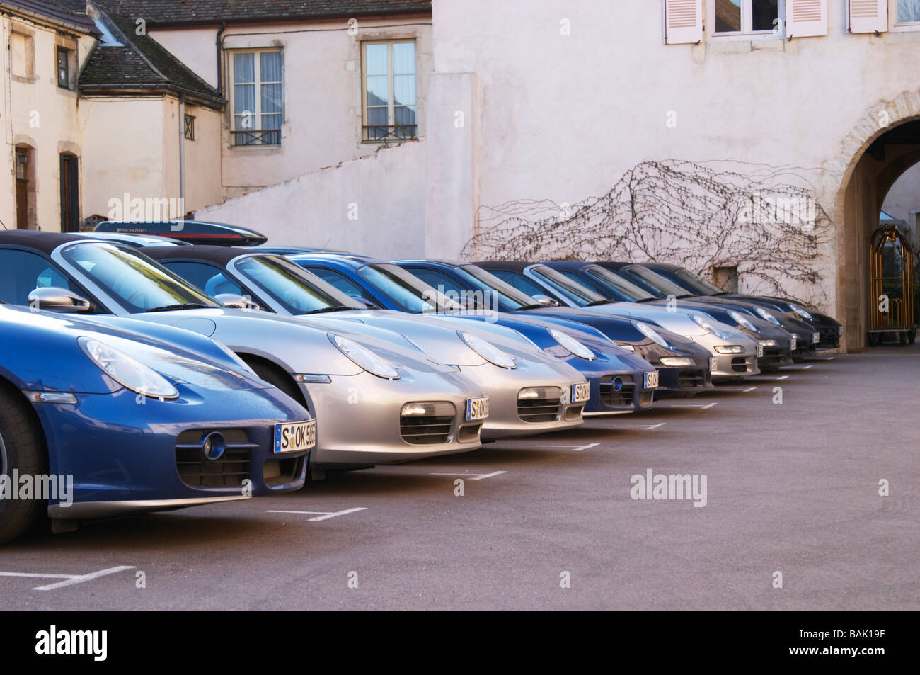 porsche cars in the parking lot of hotel le cep beaune cote de beaune burgundy france Stock Photo
