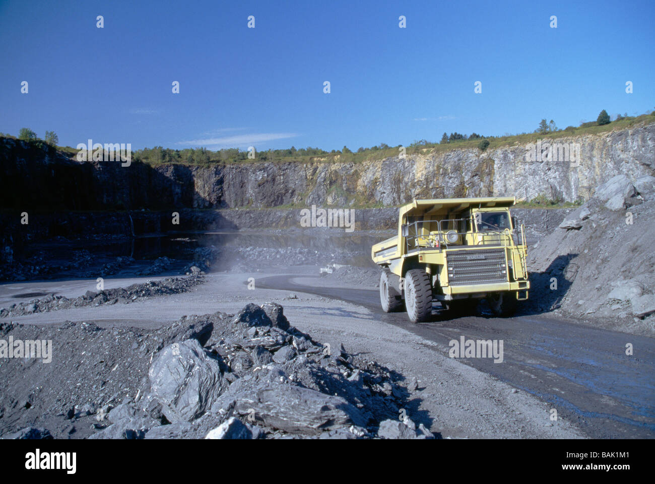 Large dump truck moving stone in a quarry in eastern Pennsylvania USA