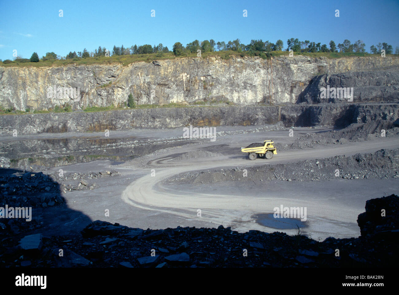 Large dump truck moving stone in a quarry in eastern Pennsylvania USA
