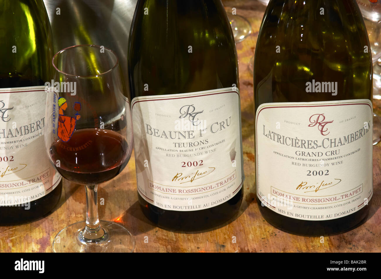 bottles on a barrel in the cellar for wine tasting dom rossignol trapet