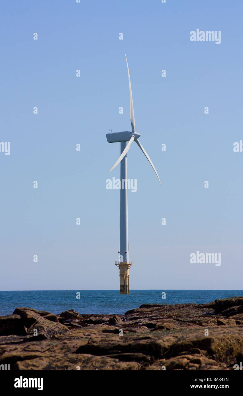 Cambois beach North of Blyth Northumberland showing small offshore wind turbine farm Stock Photo