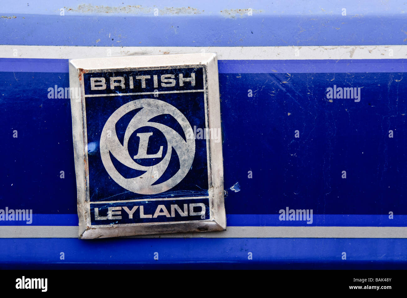 Closeup of blue British Leyland badge on blue bodywork Stock Photo