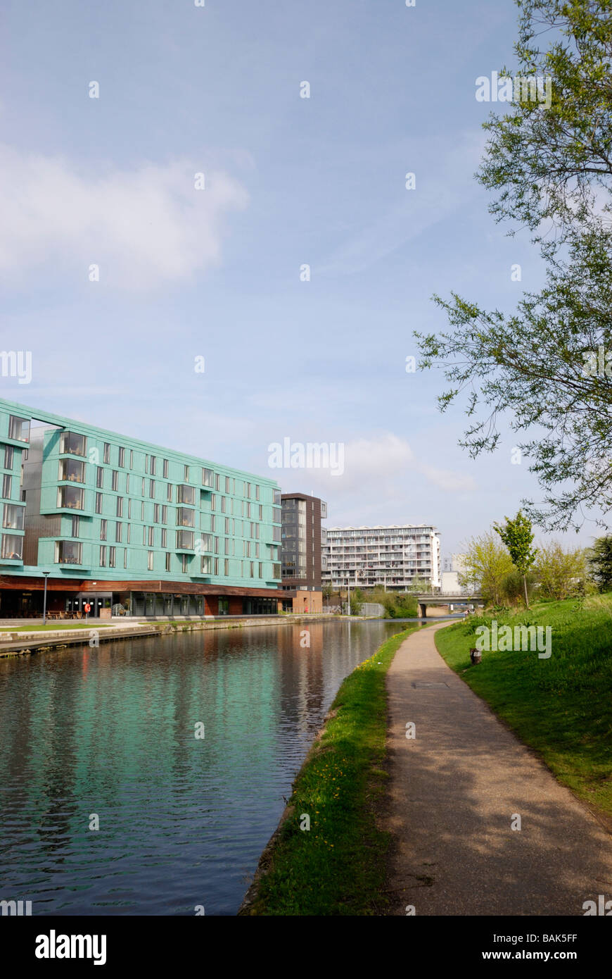 Mile End Park showing Regent's Canal and part of Queen Mary College Mile End London Stock Photo