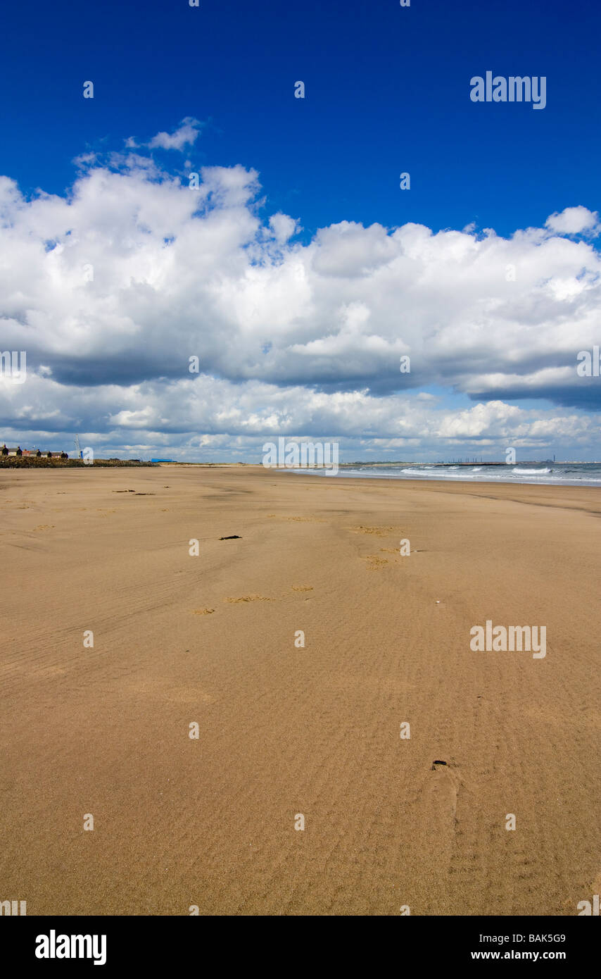 Cambois beach North of Blyth Northumberland showing small offshore wind turbine farm Stock Photo