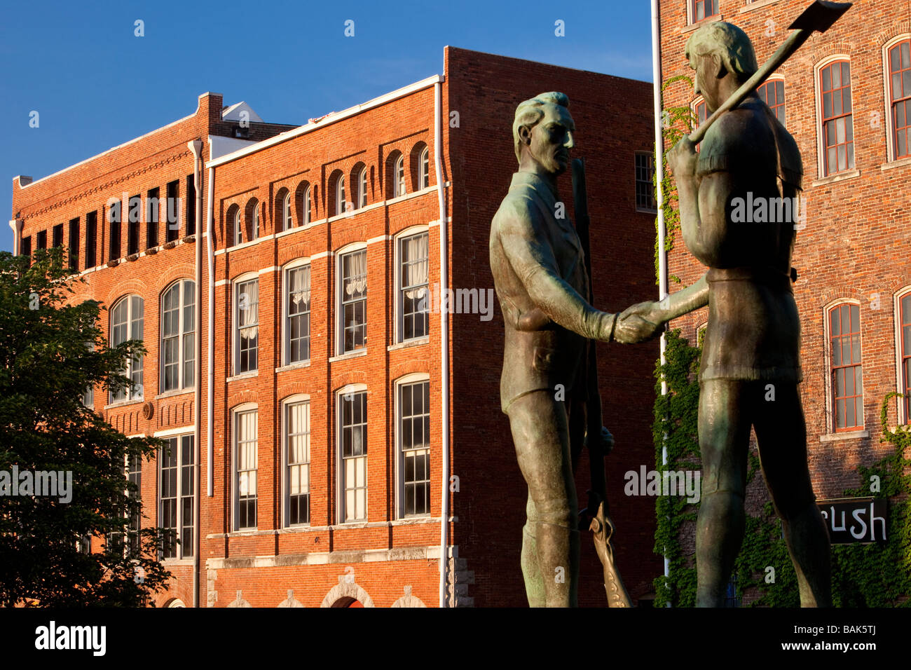 Statue of James Robertson and John Donelson along the Cumberland River in Downtown Nashville. Stock Photo