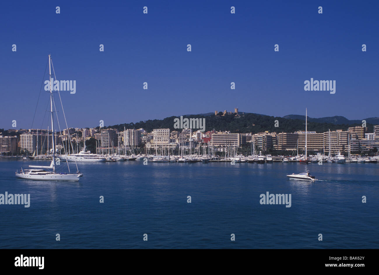 Sailing Yacht 'Hyperion'  with Bellver Castle and Paseo Maritimo behind, Palma de Mallorca Stock Photo