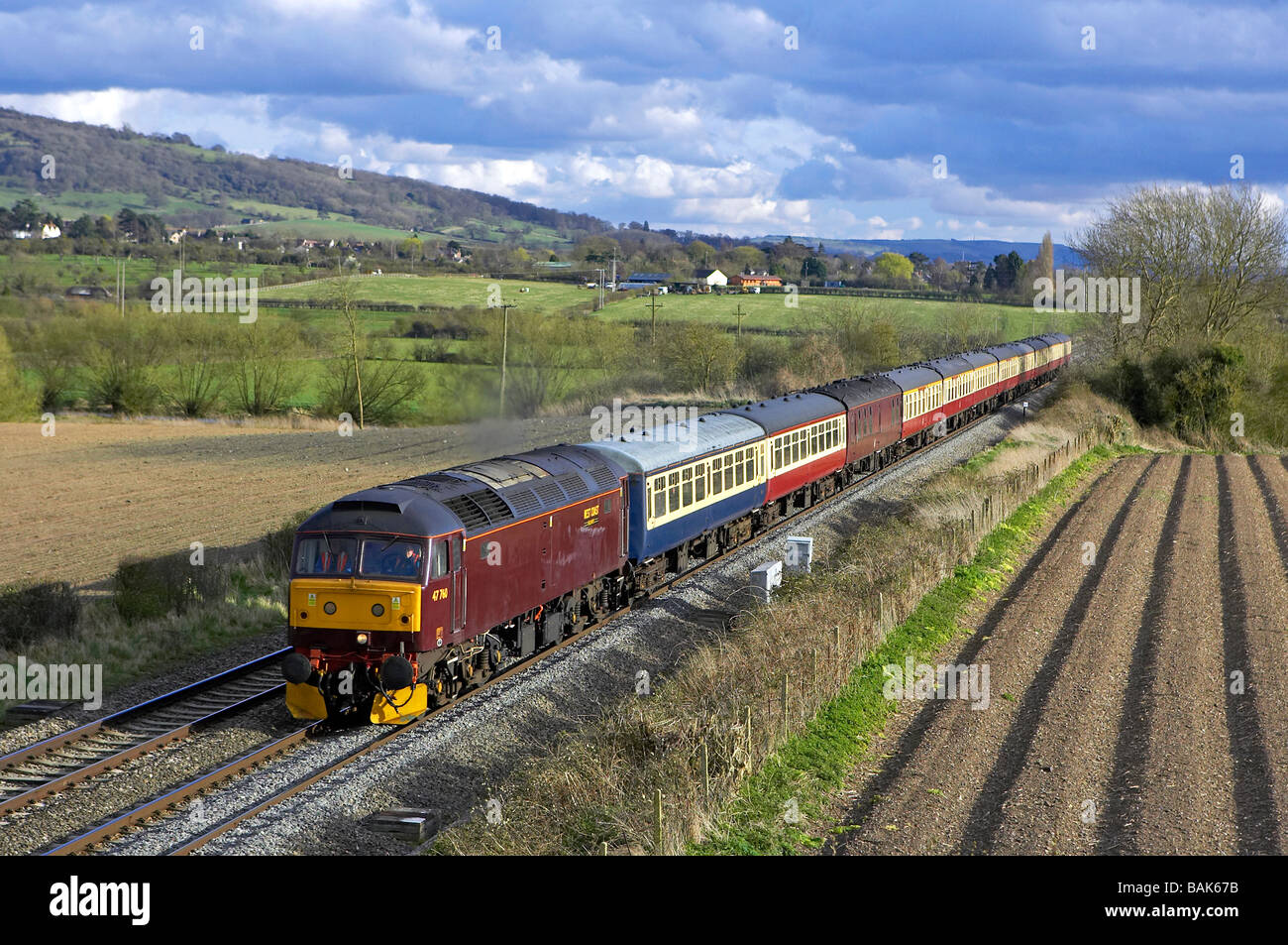 West Coast Railways 47760 heads 5Z12 13 24 Eastleigh Worcester SH tour ECS through Defford Worcestershire 27 03 09 Stock Photo