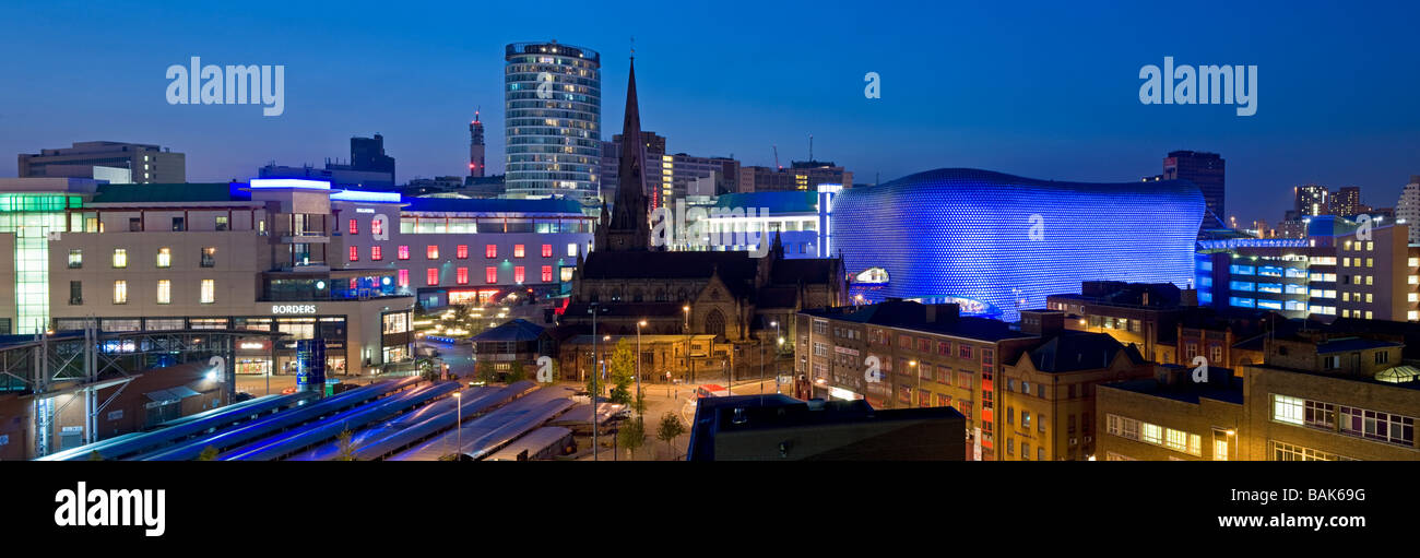 Panoramic Image of Birmingham City Centre at Night with Selfridges, St Martin's Church & The Rotunda, West Midlands, England, UK Stock Photo