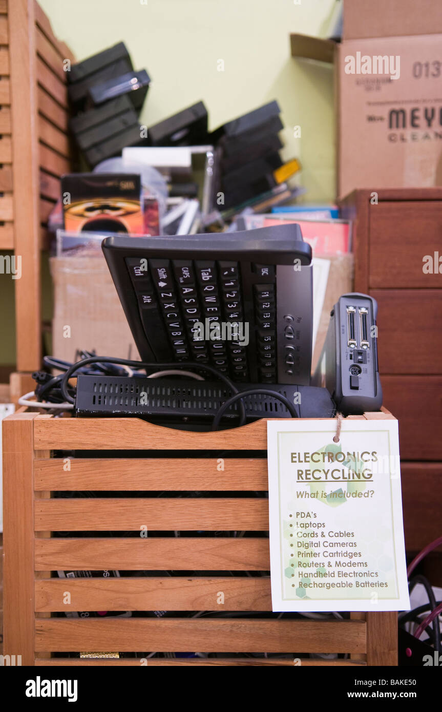 Electronics recycling bin at a recycling center within a neighborhood
